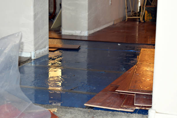 Professional Emergency Water Damage Restoration technician working in Tulare, CA